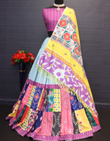 This stunning multi-color lehenga and complementing purple choli...