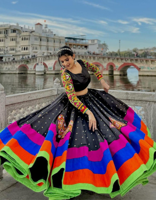 Multi-color lehenga paired elegantly with a sleek black choli