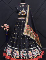 Black lehenga and matching choli, adorned with a matching dupatta