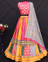 Pink and yellow lehenga, paired with a matching pink choli and a beautifully printed dupatta