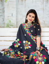 Black lehenga and choli ensemble, adorned with a matching black dupatta