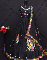 Black lehenga and choli ensemble, adorned with a matching black dupatta