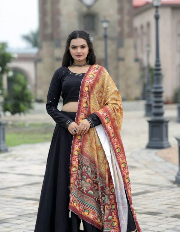 Stunning black lehenga choli and dupatta ensemble. Perfect for making a statement