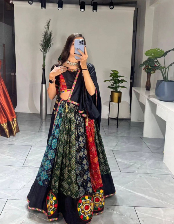 black lehenga choli ensemble, paired flawlessly with a complementary dupatta