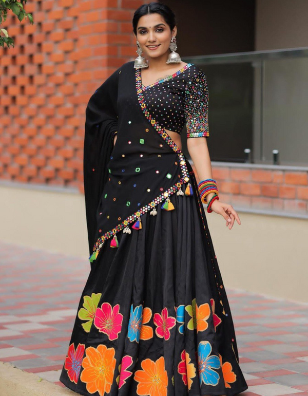 Black and multi-color floral lehenga choli ensemble, paired with a graceful black dupatta