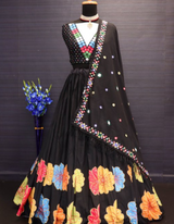 Black and multi-color floral lehenga choli ensemble, paired with a graceful black dupatta