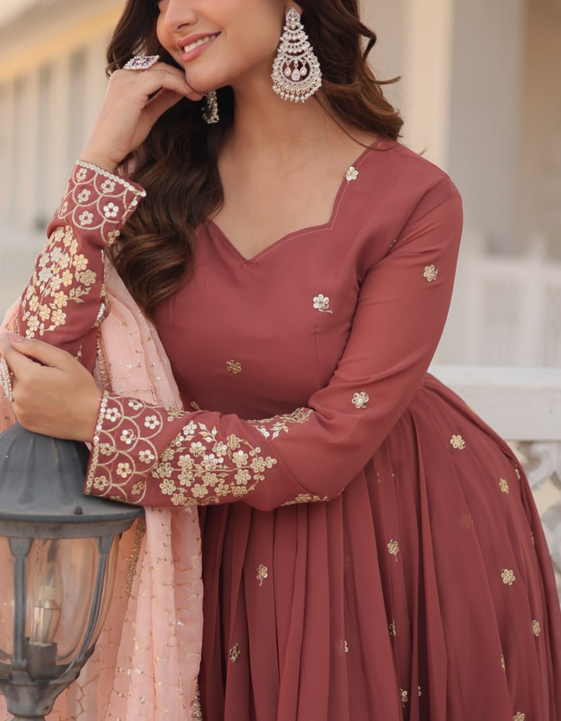 Drape yourself in timeless maroon elegance,  light pink dupatta for a touch of grace