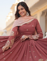 Drape yourself in timeless maroon elegance,  light pink dupatta for a touch of grace