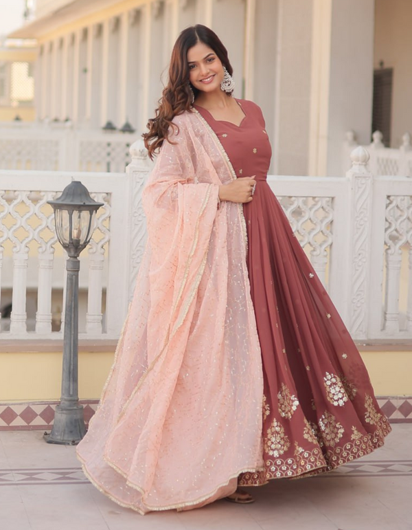 Drape yourself in timeless maroon elegance,  light pink dupatta for a touch of grace