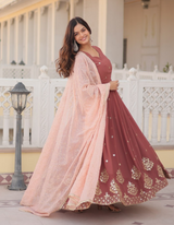 Drape yourself in timeless maroon elegance,  light pink dupatta for a touch of grace