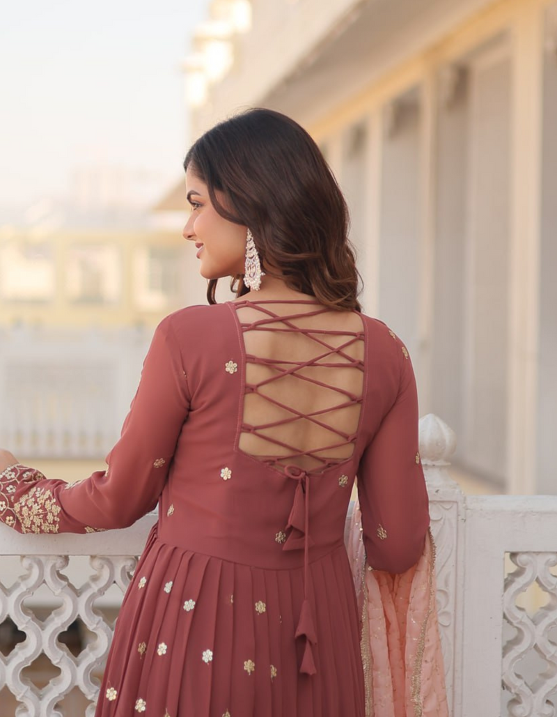 Drape yourself in timeless maroon elegance,  light pink dupatta for a touch of grace