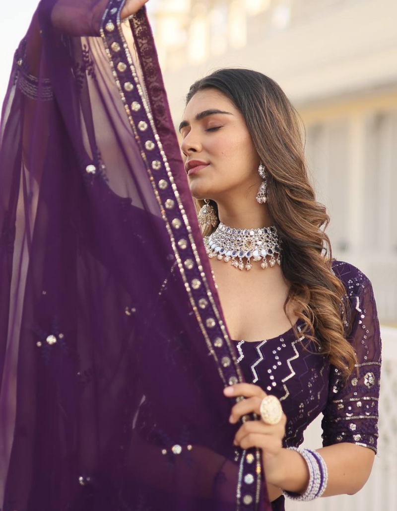 Blue with this intricately embroidered lehenga, paired flawlessly with a matching embroidered dupatta