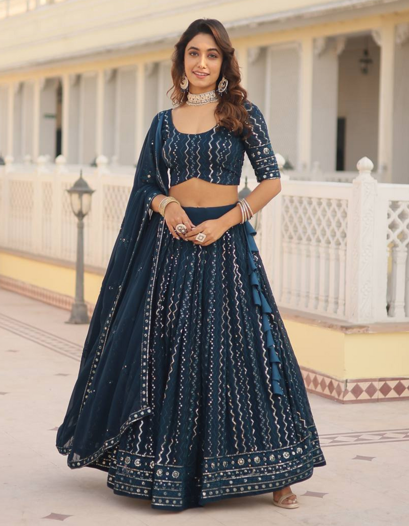 Charm of a matching morpich lehenga and embroidered dupatta.