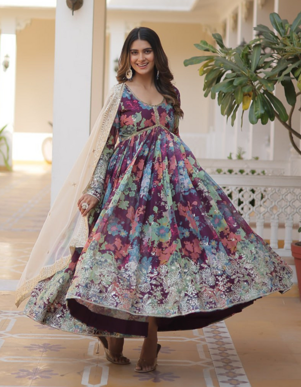 Embrace sophistication with a printed gown adorned with intricate embroidery