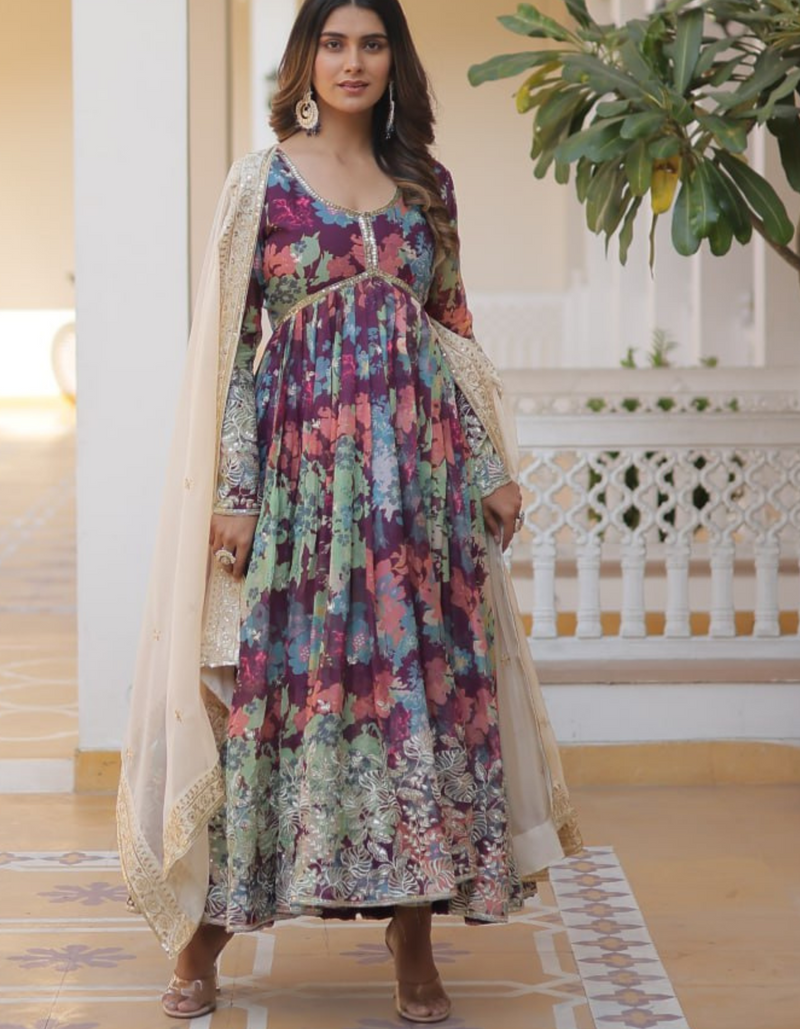 Embrace sophistication with a printed gown adorned with intricate embroidery