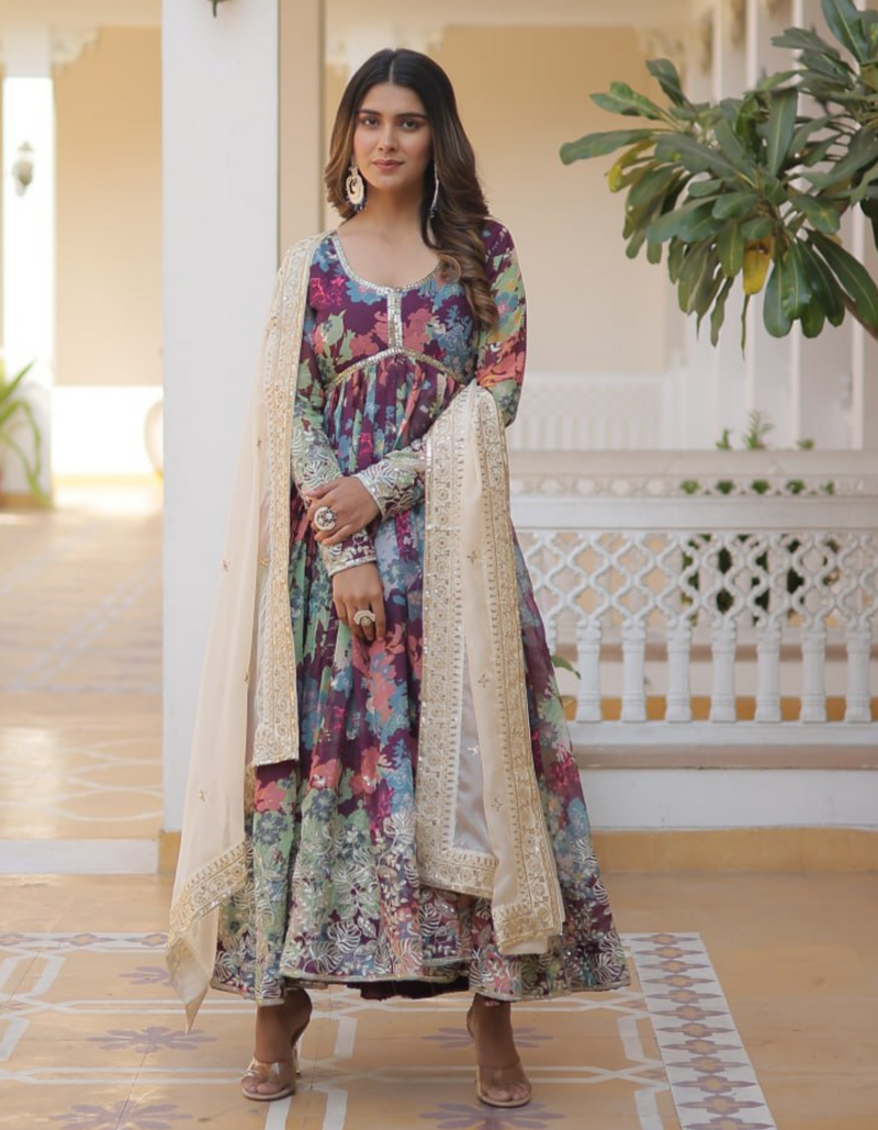 Embrace sophistication with a printed gown adorned with intricate embroidery