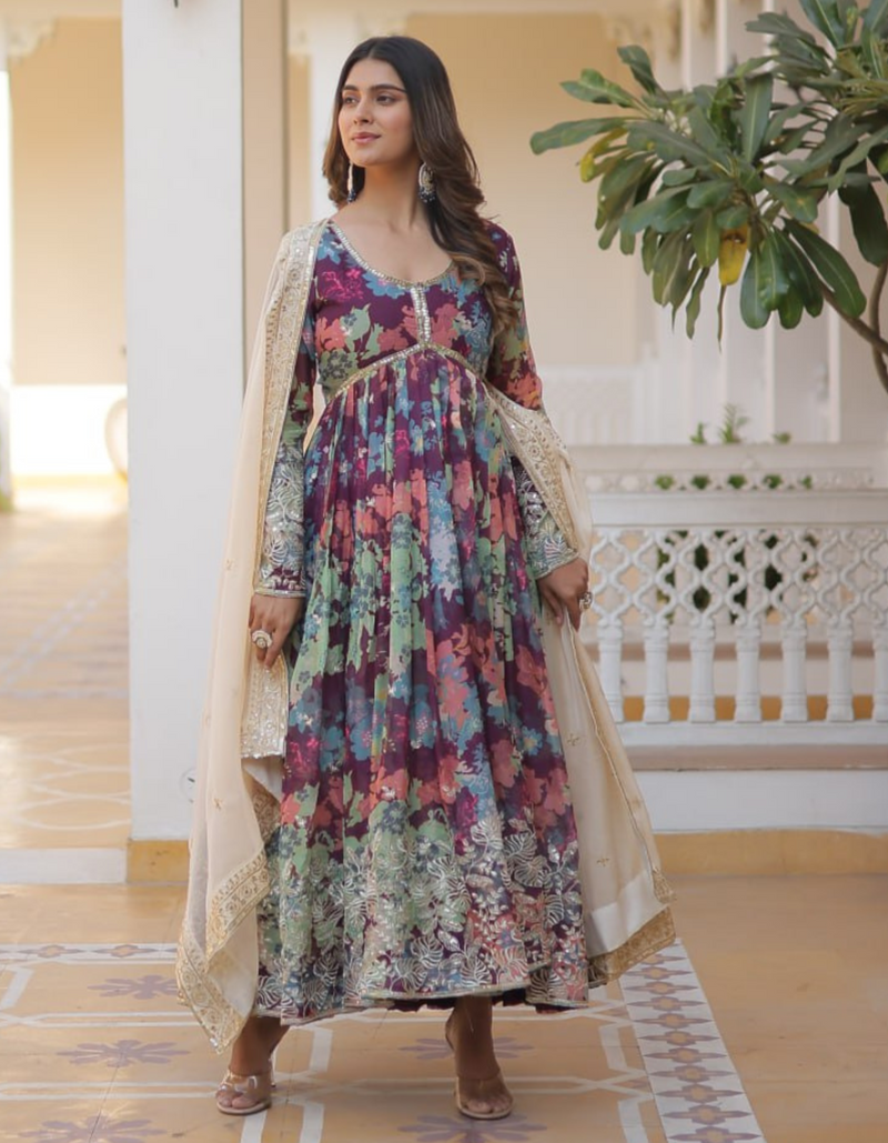 Embrace sophistication with a printed gown adorned with intricate embroidery