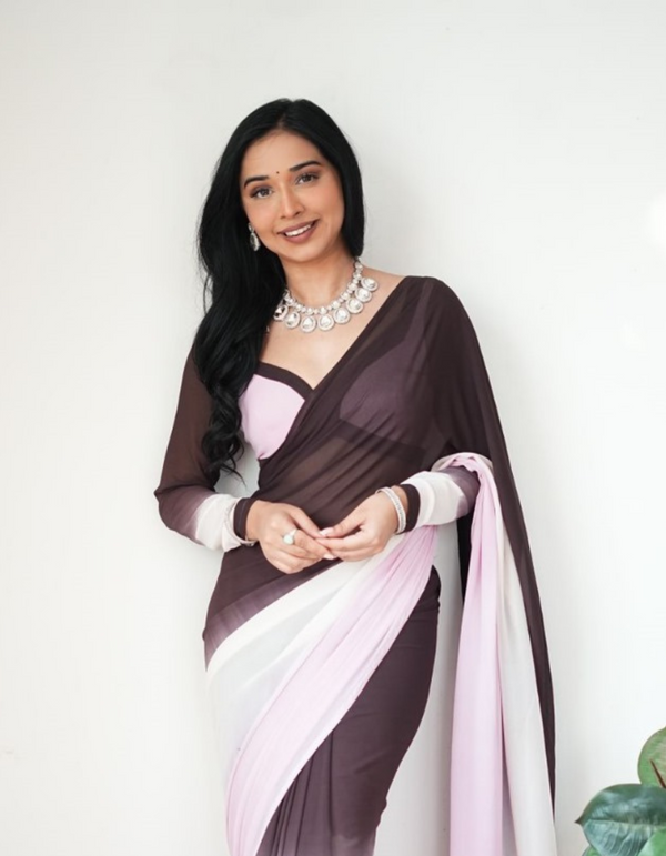 Step into elegance with this ready-to-wear saree, featuring a harmonious blend