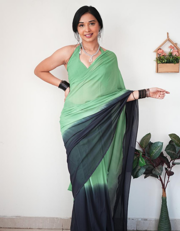 Embrace the striking contrast of green and black in this ready-to-wear saree.