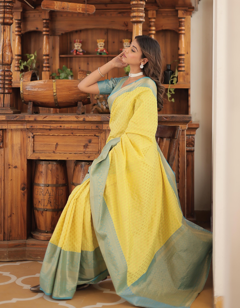 Captivating contrast in sky blue and dark yellow Kanjivaram saree