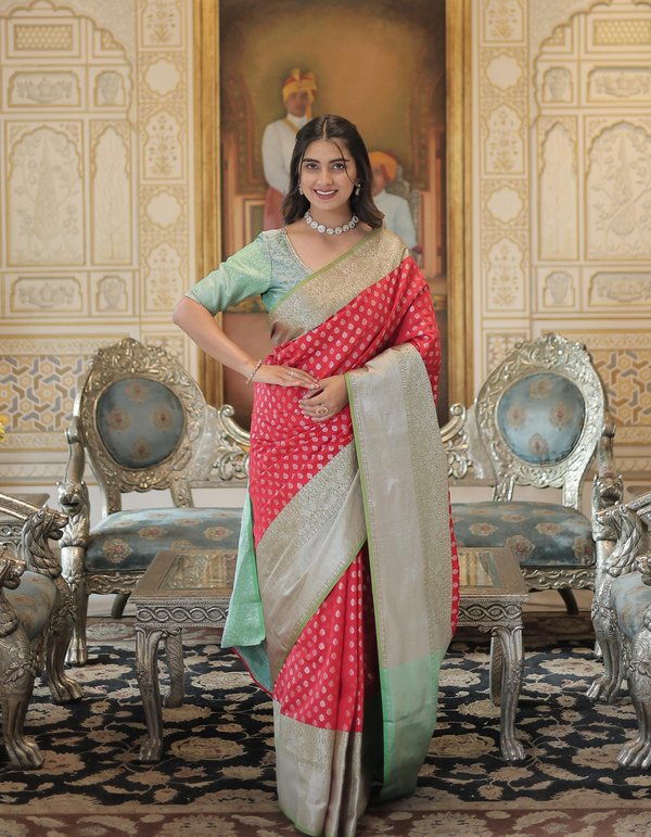 palette of light red, sky blue, and grey, woven into graceful sarees