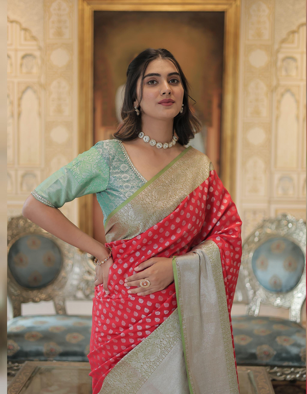 palette of light red, sky blue, and grey, woven into graceful sarees