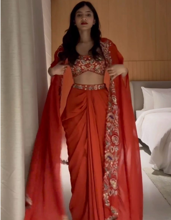 red three-piece suit with intricate embroidery