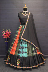 black lehenga choli ensemble, paired flawlessly with a complementary dupatta